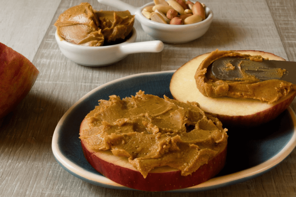 Apple slices with peanut butter - a healthy and easy movie night snack