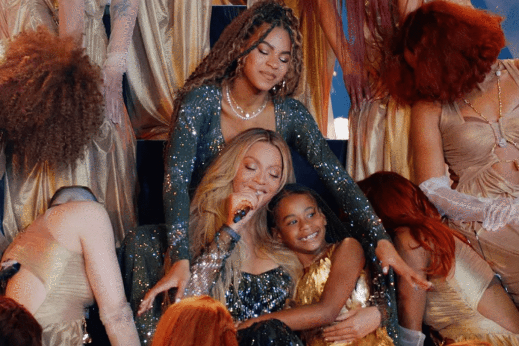 Beyoncé performing on stage with her daughters Blue Ivy Carter and Rumi Carter during the Cowboy Carter tour at SoFi Stadium in Los Angeles