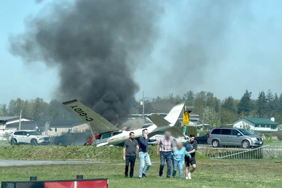 Wreckage of Rob Holland’s MX Aircraft MXS at Langley Air Force Base after the fatal crash on approach, with emergency responders present