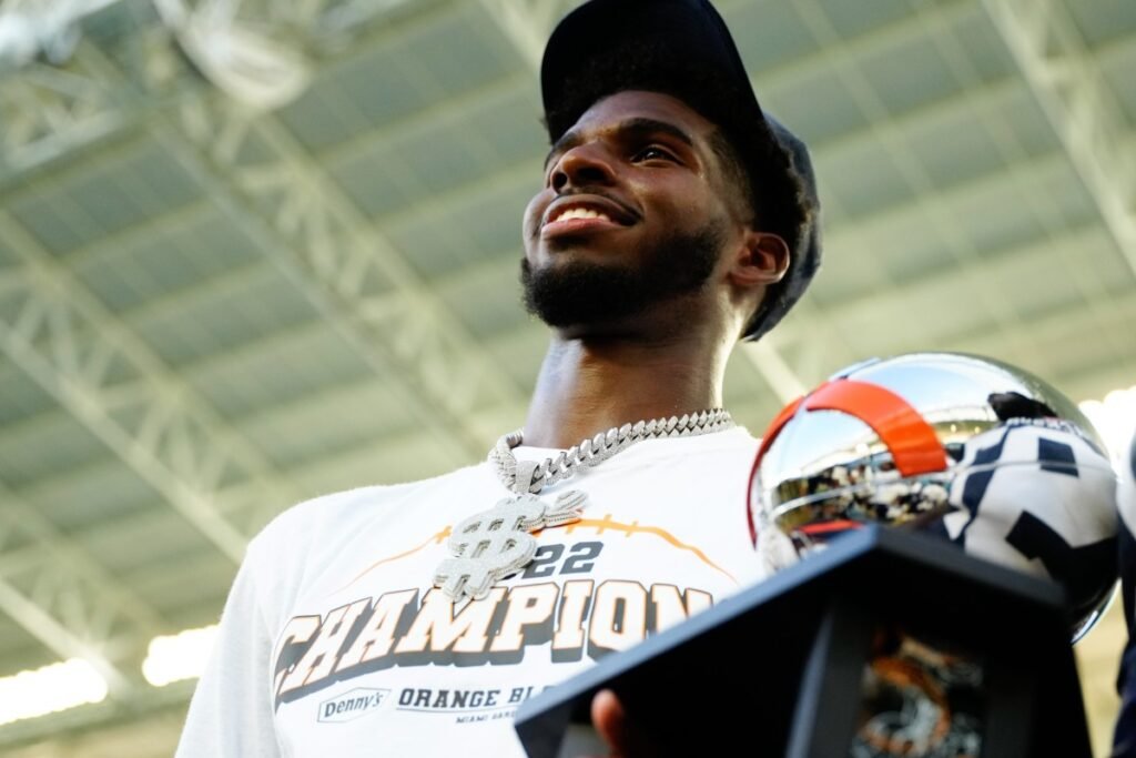 Shedeur Sanders watching the 2025 NFL Draft with his family in Texas after falling out of the first round.